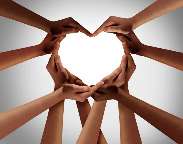 An image of nine hands all coming together to make a heart shape in front of a white background.
