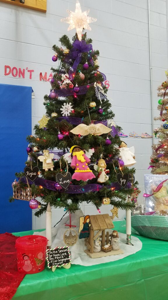 Picture of a Christmas Tree decorated in the season of Advent.